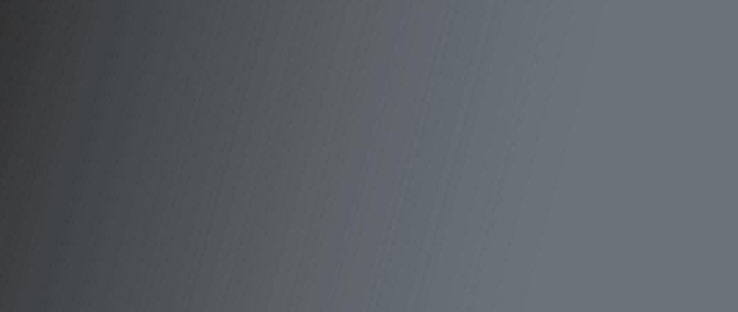 A blurred gray background with no identifiable features or content.